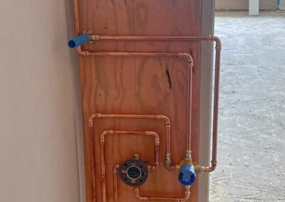 Sheraton Hotel guest room bathrooms fabricated pipe assembly install